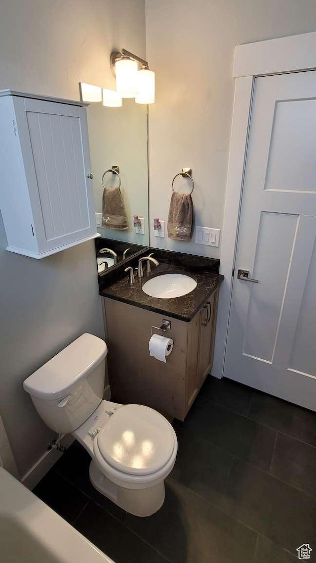 1016 N Vista Loop, Morgan, UT 84050 - half bathroom with tile patterned flooring, toilet, and vanity