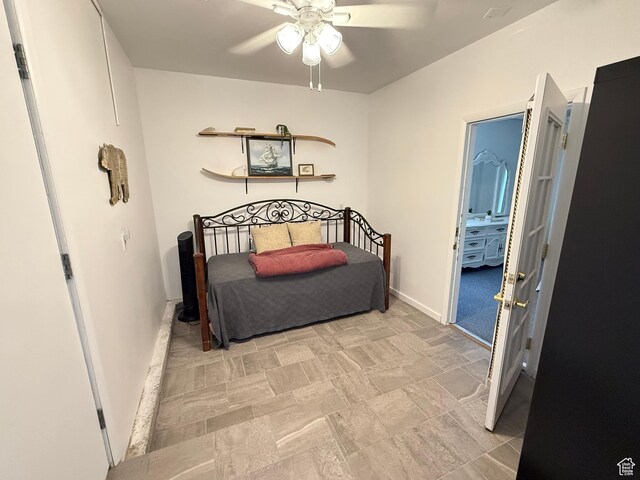 1705 S Bear Lake Blvd, Garden City, UT 84028 - bedroom featuring ceiling fan and baseboards