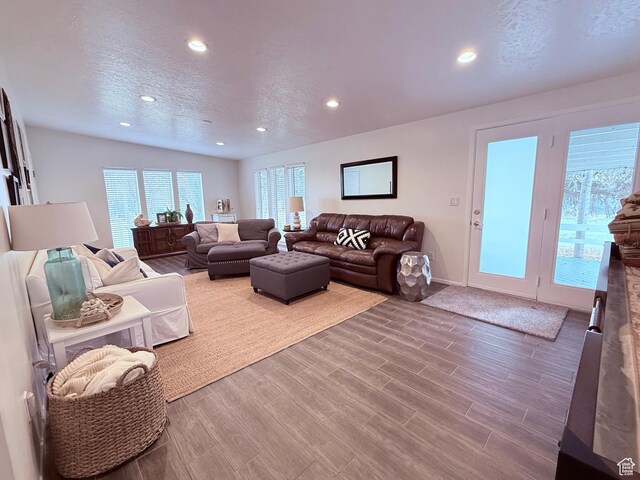 1705 S Bear Lake Blvd, Garden City, UT 84028 - living area with baseboards, a textured ceiling, recessed lighting, and wood finished floors
