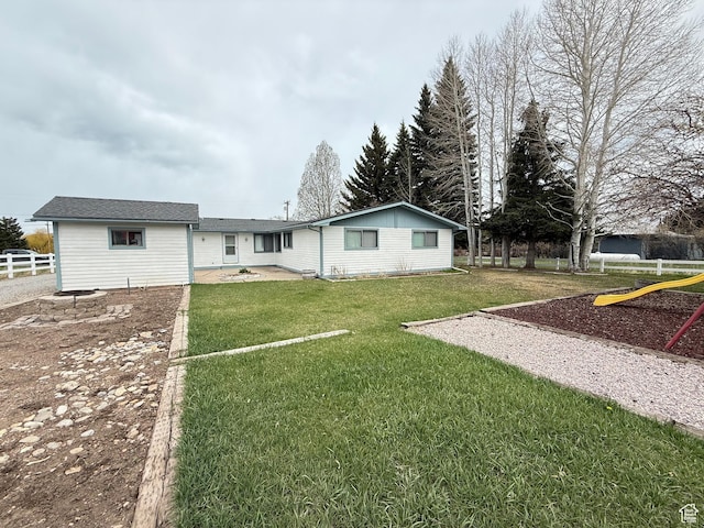 1705 S Bear Lake Blvd, Garden City, UT 84028 - back of house featuring fence and a yard