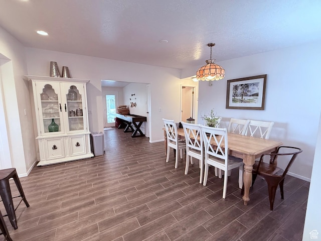 1705 S Bear Lake Blvd, Garden City, UT 84028 - dining area with baseboards and dark wood finished floors