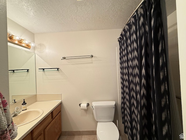1705 S Bear Lake Blvd, Garden City, UT 84028 - full bathroom featuring vanity, tile patterned flooring, toilet, and a textured ceiling