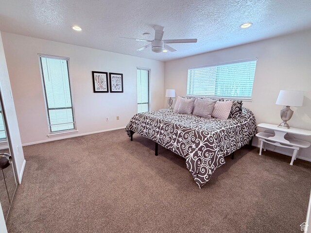 1705 S Bear Lake Blvd, Garden City, UT 84028 - bedroom featuring baseboards, a textured ceiling, carpet, and a ceiling fan