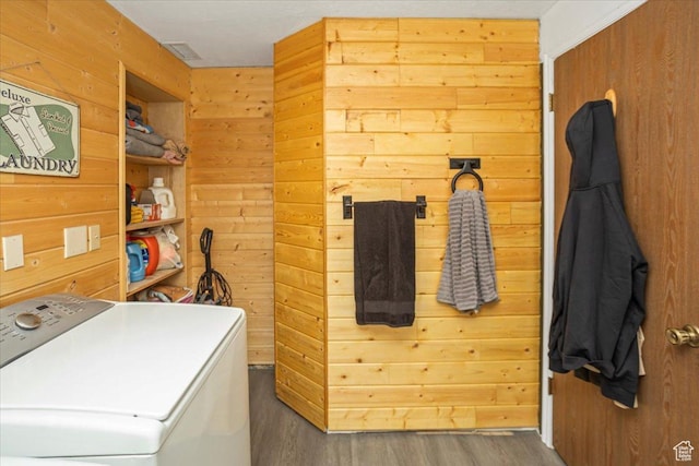 33 S Benchview Dr E, Tooele, UT 84074 - washroom featuring laundry area, washer / clothes dryer, wood finished floors, and wooden walls