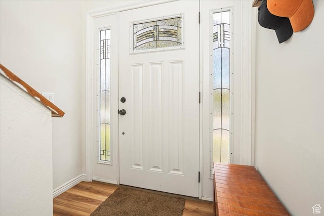 33 S Benchview Dr E, Tooele, UT 84074 - foyer featuring baseboards, plenty of natural light, and light wood-style floors