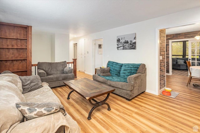 33 S Benchview Dr E, Tooele, UT 84074 - living area featuring light wood-style floors and baseboards