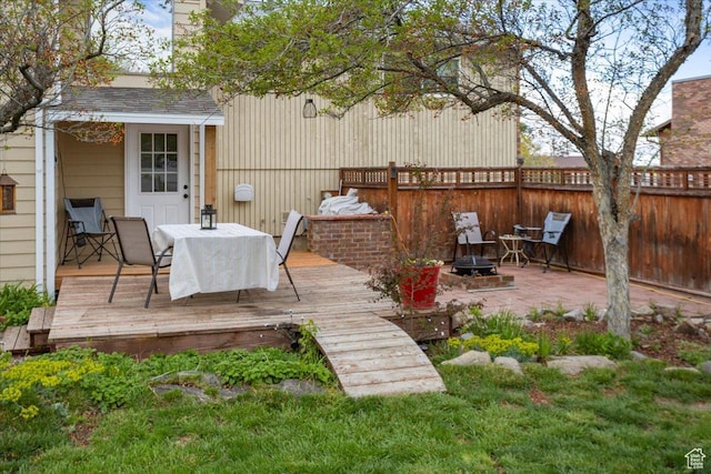 33 S Benchview Dr E, Tooele, UT 84074 - exterior space featuring fence, outdoor dining area, and a fire pit