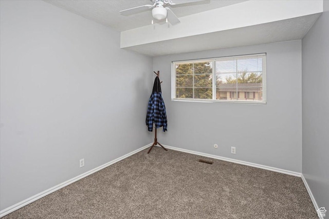 33 S Benchview Dr E, Tooele, UT 84074 - empty room with carpet flooring, a ceiling fan, baseboards, and visible vents