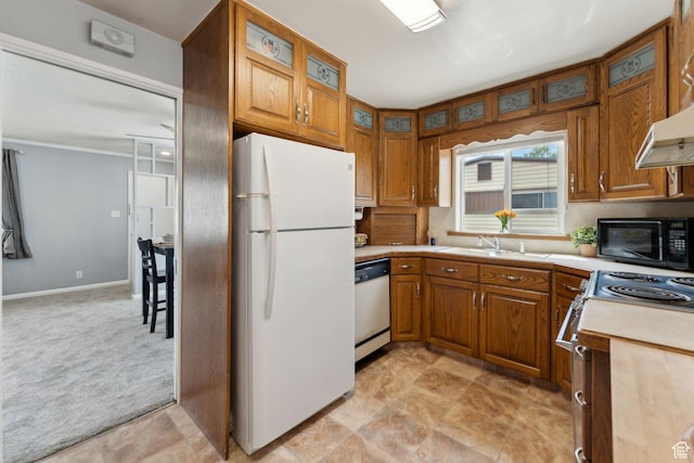 981 N 1300 W, Salt Lake City, UT 84116 - kitchen with brown cabinets, a sink, light countertops, glass insert cabinets, and white appliances