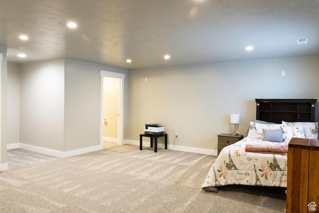 5229 W Armada Way, Herriman, UT 84096 - carpeted bedroom with baseboards, recessed lighting, and connected bathroom
