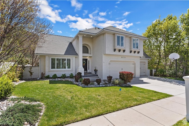 view of front of property featuring a garage, brick siding, concrete driveway, and a tiled roof