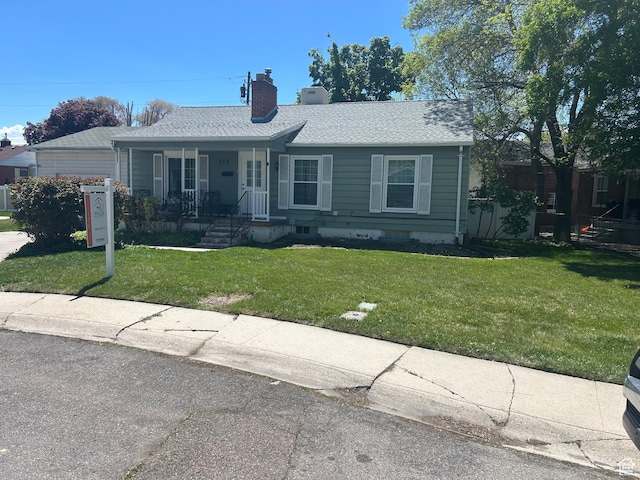 314 Harvard Cir, American Fork, UT 84003 - ranch-style house with a porch, roof with shingles, a chimney, and a front yard