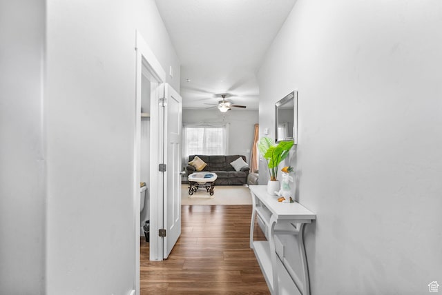 7465 N Cottage Ln, Eagle Mountain, UT 84005 - corridor featuring dark wood-type flooring