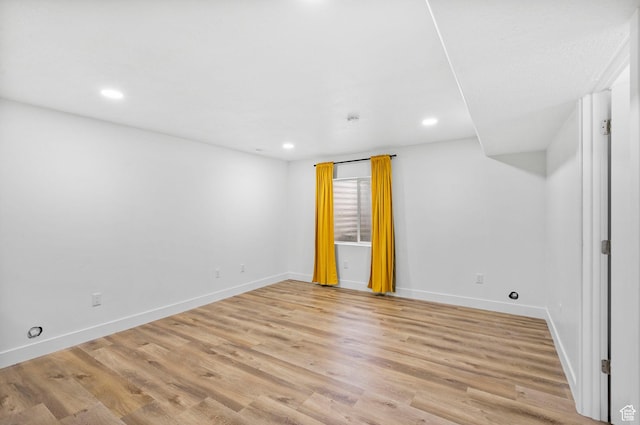 7465 N Cottage Ln, Eagle Mountain, UT 84005 - basement with baseboards, recessed lighting, and light wood-style flooring