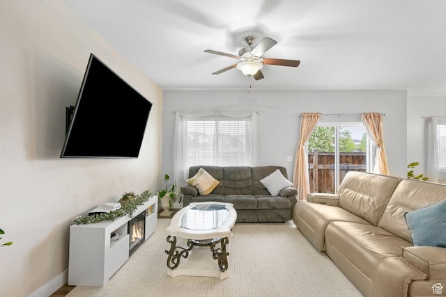 7465 N Cottage Ln, Eagle Mountain, UT 84005 - carpeted living area with a ceiling fan