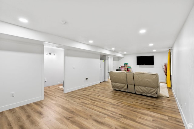 7465 N Cottage Ln, Eagle Mountain, UT 84005 - living room with baseboards, light wood-type flooring, and recessed lighting