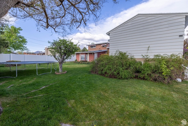 5393 S 700 E, South Ogden, UT 84405 - view of yard featuring fence and a trampoline