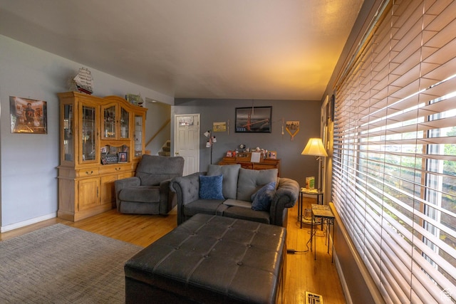 5393 S 700 E, South Ogden, UT 84405 - living area with visible vents, stairway, and light wood-style floors