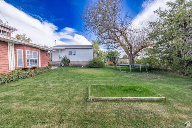5393 S 700 E, South Ogden, UT 84405 - view of yard with a trampoline