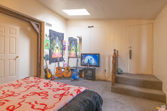 5393 S 700 E, South Ogden, UT 84405 - carpeted bedroom with visible vents and lofted ceiling with skylight