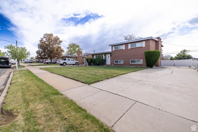 5393 S 700 E, South Ogden, UT 84405 - exterior space with brick siding, a lawn, and fence