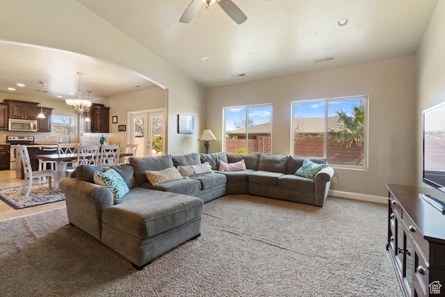 430 N 3450 W, Hurricane, UT 84737 - living area with arched walkways, a chandelier, healthy amount of natural light, light carpet, and recessed lighting
