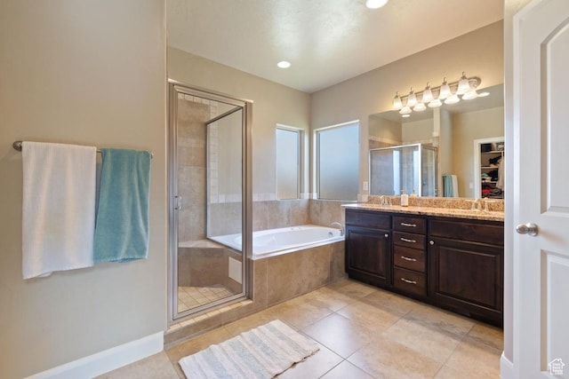 430 N 3450 W, Hurricane, UT 84737 - bathroom with a stall shower, tile patterned floors, a garden tub, double vanity, and a walk in closet