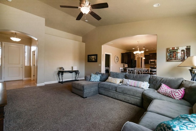 430 N 3450 W, Hurricane, UT 84737 - living area with arched walkways, carpet floors, a chandelier, a ceiling fan, and baseboards