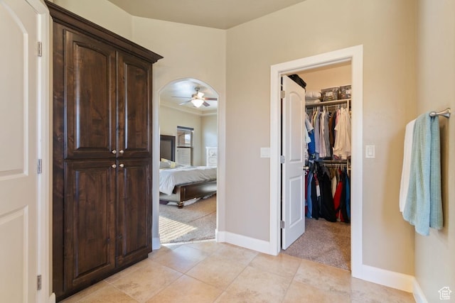 430 N 3450 W, Hurricane, UT 84737 - foyer entrance featuring light colored carpet, baseboards, light tile patterned floors, ceiling fan, and crown molding