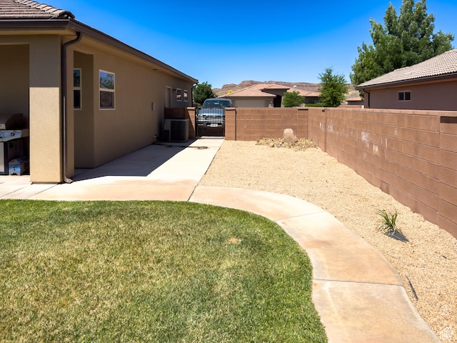 430 N 3450 W, Hurricane, UT 84737 - view of yard with central AC and a patio area