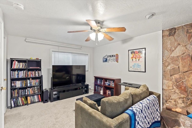 1554 S Monroe Blvd Unit F4, Ogden, UT 84404 - carpeted living room with a ceiling fan and a textured ceiling