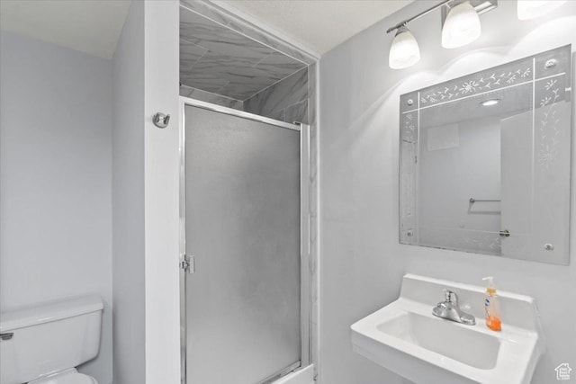 1554 S Monroe Blvd Unit F4, Ogden, UT 84404 - full bath with a sink, a stall shower, and toilet