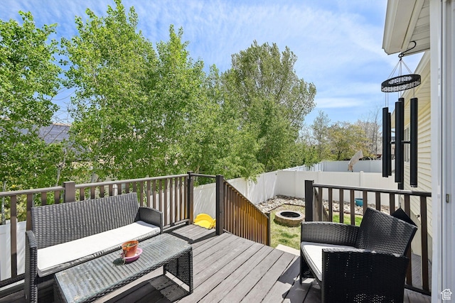 8551 S Laurel Oak Dr W, West Jordan, UT 84081 - wooden deck with a fenced backyard and an outdoor fire pit
