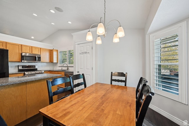 8551 S Laurel Oak Dr W, West Jordan, UT 84081 - dining area with recessed lighting, dark wood finished floors, an inviting chandelier, and lofted ceiling