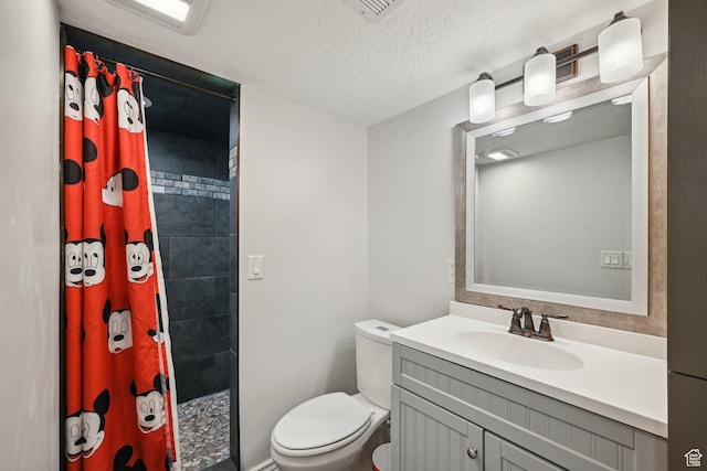 8551 S Laurel Oak Dr W, West Jordan, UT 84081 - full bath with vanity, a textured ceiling, toilet, and tiled shower