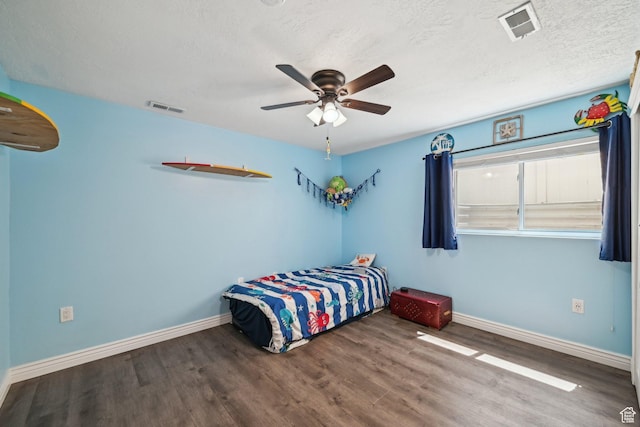 8551 S Laurel Oak Dr W, West Jordan, UT 84081 - bedroom featuring visible vents, a ceiling fan, baseboards, and wood finished floors