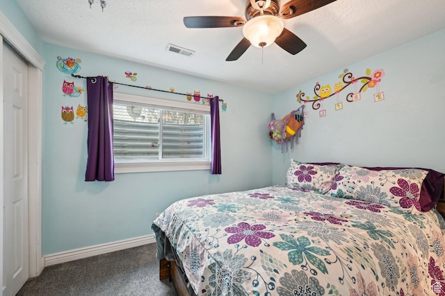 8551 S Laurel Oak Dr W, West Jordan, UT 84081 - carpeted bedroom with visible vents, a ceiling fan, baseboards, and a closet