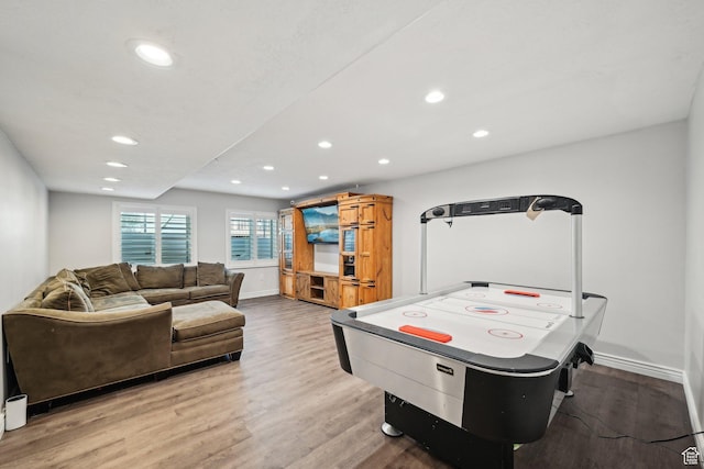 8551 S Laurel Oak Dr W, West Jordan, UT 84081 - recreation room with recessed lighting, baseboards, and light wood-type flooring