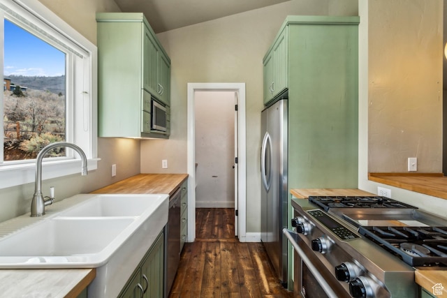 1586 Splendor Valley Rd, Kamas, UT 84036 - kitchen featuring green cabinets, a sink, stainless steel appliances, dark wood-type flooring, and light countertops