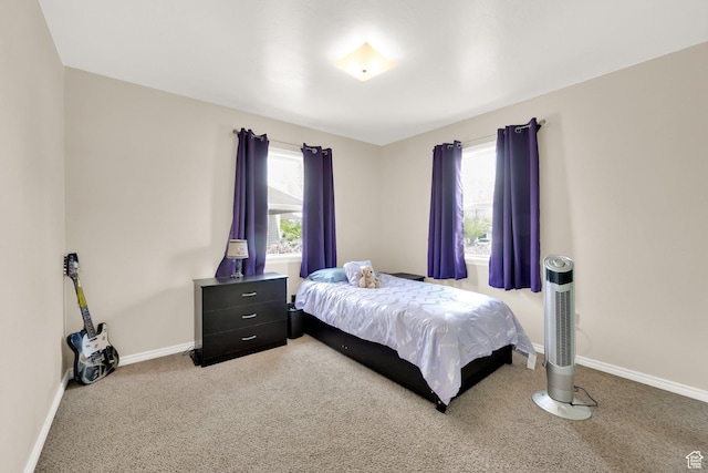 5756 S 4540 W, Kearns, UT 84118 - bedroom featuring baseboards and light carpet