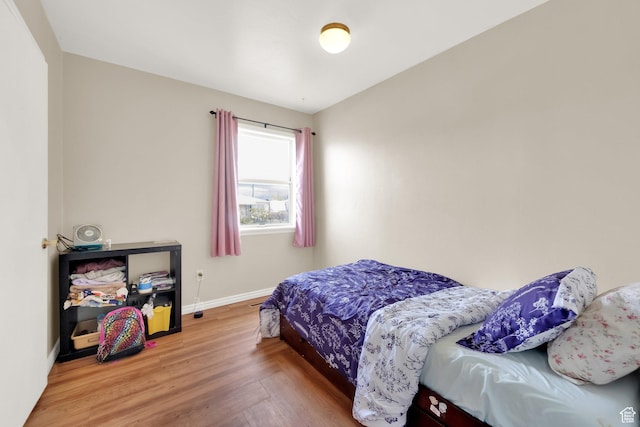 5756 S 4540 W, Kearns, UT 84118 - bedroom featuring baseboards and wood finished floors