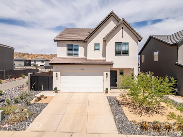 1506 S Wagon Box Way, Washington, UT 84780 - traditional home with fence, an attached garage, concrete driveway, and stucco siding