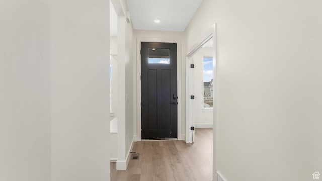 2298 E Parkside Cir S, South Ogden, UT 84403 - corridor with baseboards, light wood finished floors, and visible vents