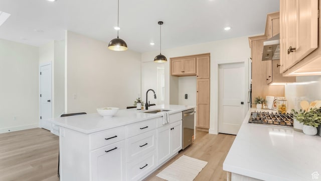 2298 E Parkside Cir S, South Ogden, UT 84403 - kitchen with a sink, light countertops, stainless steel appliances, light wood-type flooring, and a center island with sink