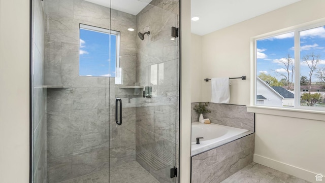 2298 E Parkside Cir S, South Ogden, UT 84403 - full bathroom with baseboards, a garden tub, and a stall shower