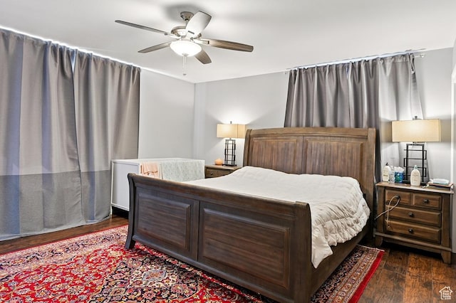 63 E Main, Bicknell, UT 84715 - bedroom featuring a ceiling fan and dark wood finished floors