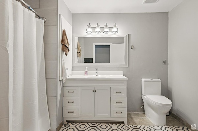 63 E Main, Bicknell, UT 84715 - full bathroom with vanity, baseboards, visible vents, and toilet