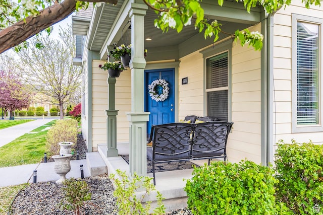 entrance to property featuring a porch