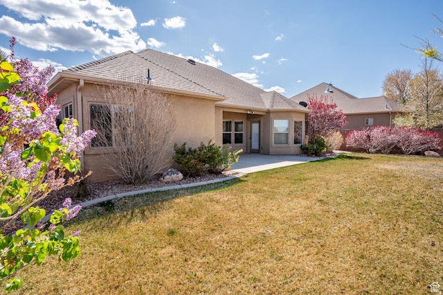 194 S 2875 W, Cedar City, UT 84720 - back of property with a yard, a patio, and stucco siding