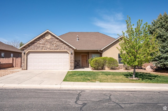 ranch-style house with a garage, a front lawn, driveway, and stone siding